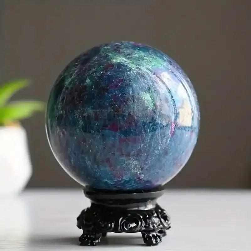 Polished red and blue Kyanite sphere on a decorative stand, perfect for meditation, healing, and unique home decor.