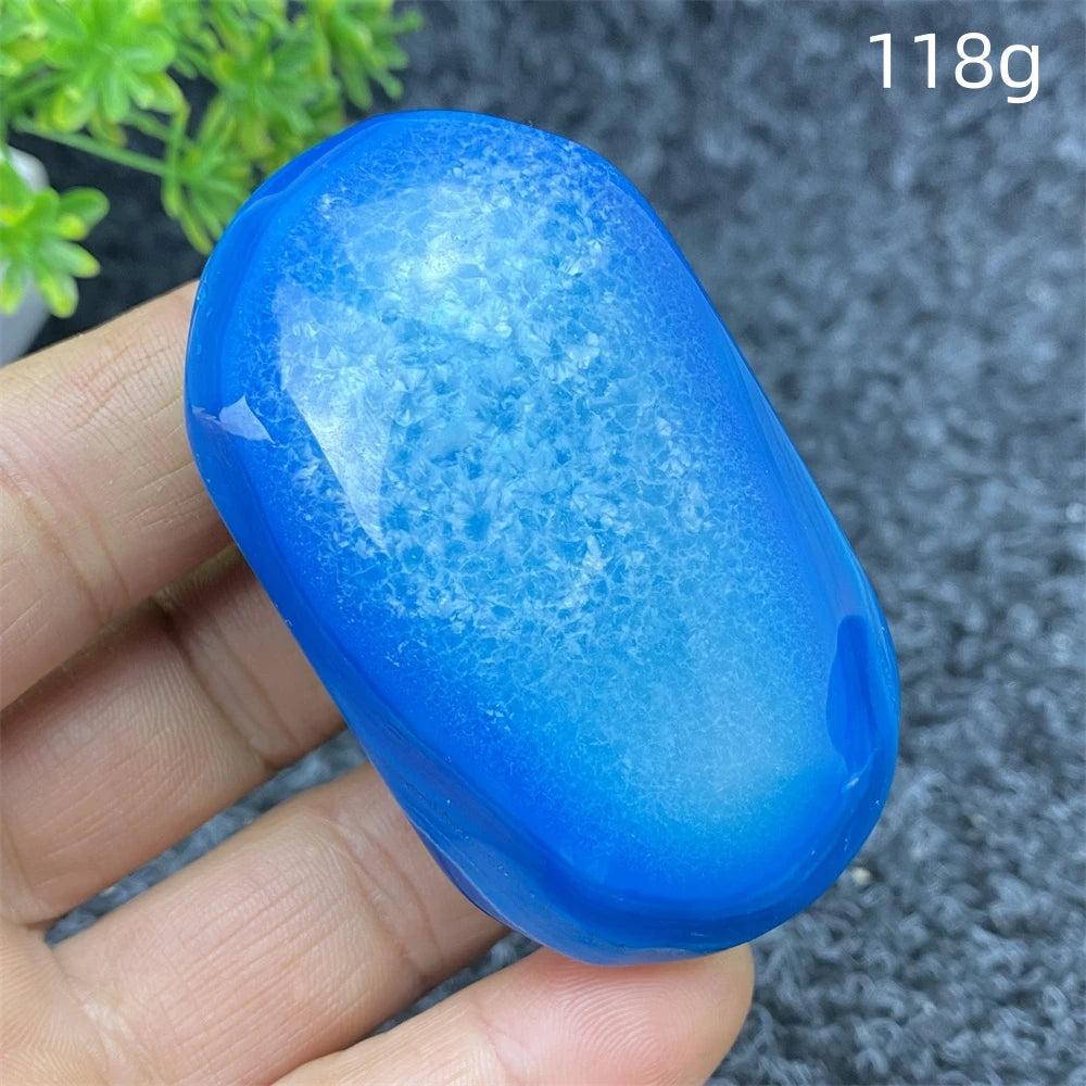Polished 118g Blue Lace Agate palm stone with calming blue hues, perfect for healing, meditation, and home decor.