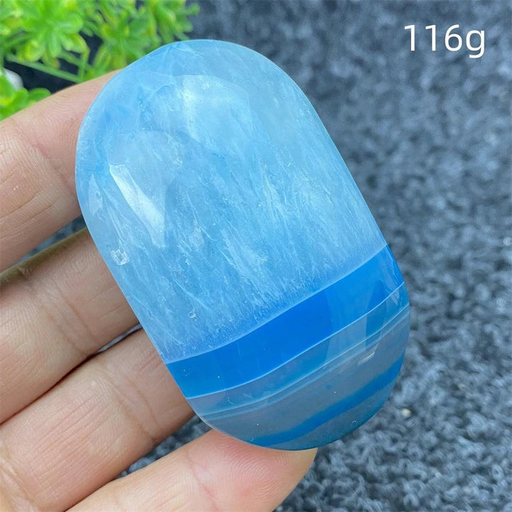 116g polished Blue Lace Agate palm stone with calming sky-blue banding, perfect for healing, meditation, and home decor.