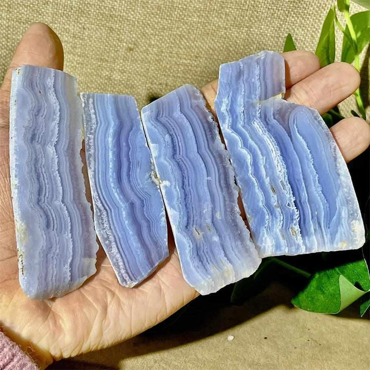 Polished Blue Lace Agate slab featuring calming pale blue and white lace-like bands for Throat Chakra healing and display.