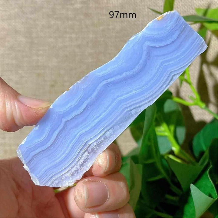 Polished Blue Lace Agate slab with delicate pale blue and white bands, perfect for Throat Chakra healing and desk decor.