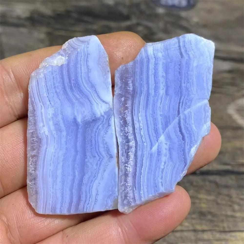 Polished Blue Lace Agate slab featuring calming pale blue and white lace-like bands for Throat Chakra healing.