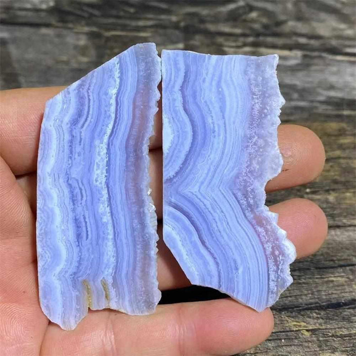 Polished Blue Lace Agate slab featuring calming pale blue and white lace-like bands for Throat Chakra healing.