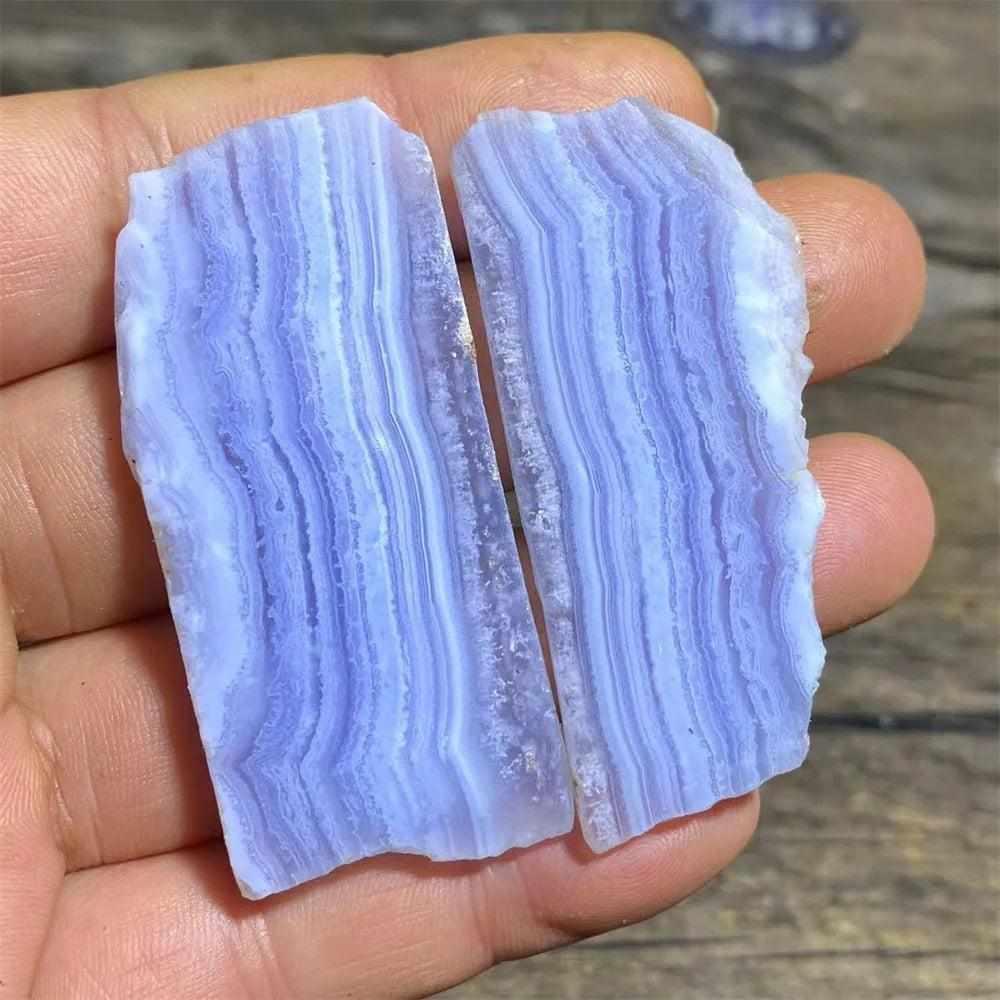 Polished Blue Lace Agate slab featuring delicate pale blue and white bands for calming Throat Chakra energy.