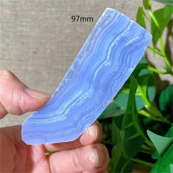 Polished Blue Lace Agate slab with calming pale blue and white lace-like bands, perfect for Throat Chakra healing.