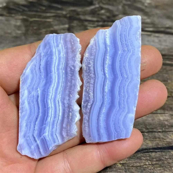 Polished Blue Lace Agate slab featuring soothing pale blue and white bands for calming Throat Chakra energy.