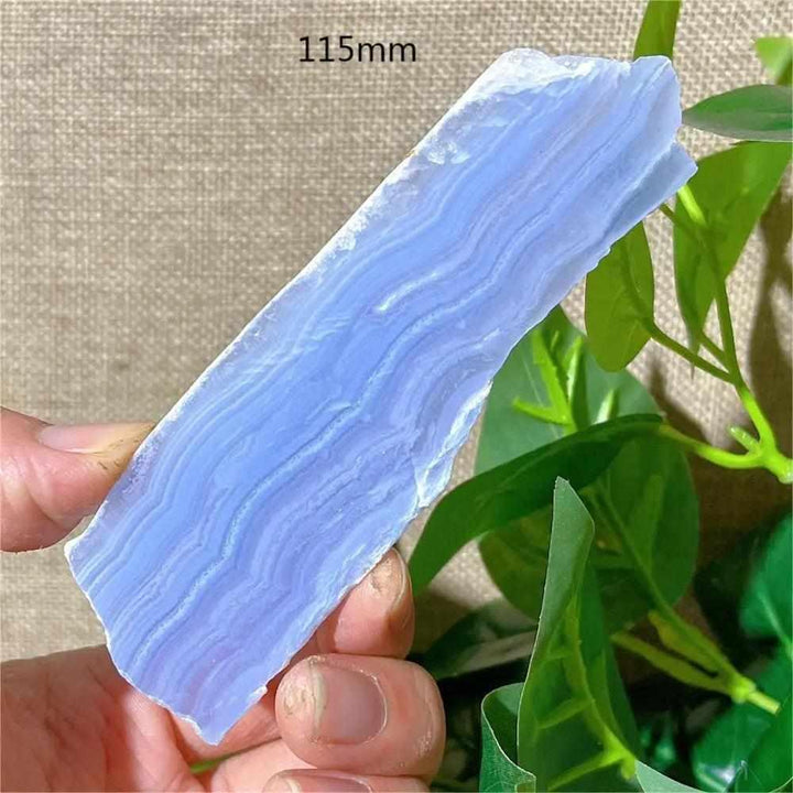 Polished Blue Lace Agate slab featuring calming pale blue and white lace-like bands for Throat Chakra healing and display.