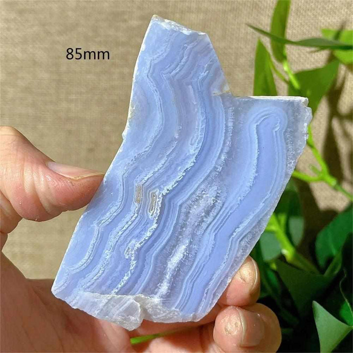 Polished 85mm Blue Lace Agate slab featuring calming pale blue and white lace-like bands for Throat Chakra healing.