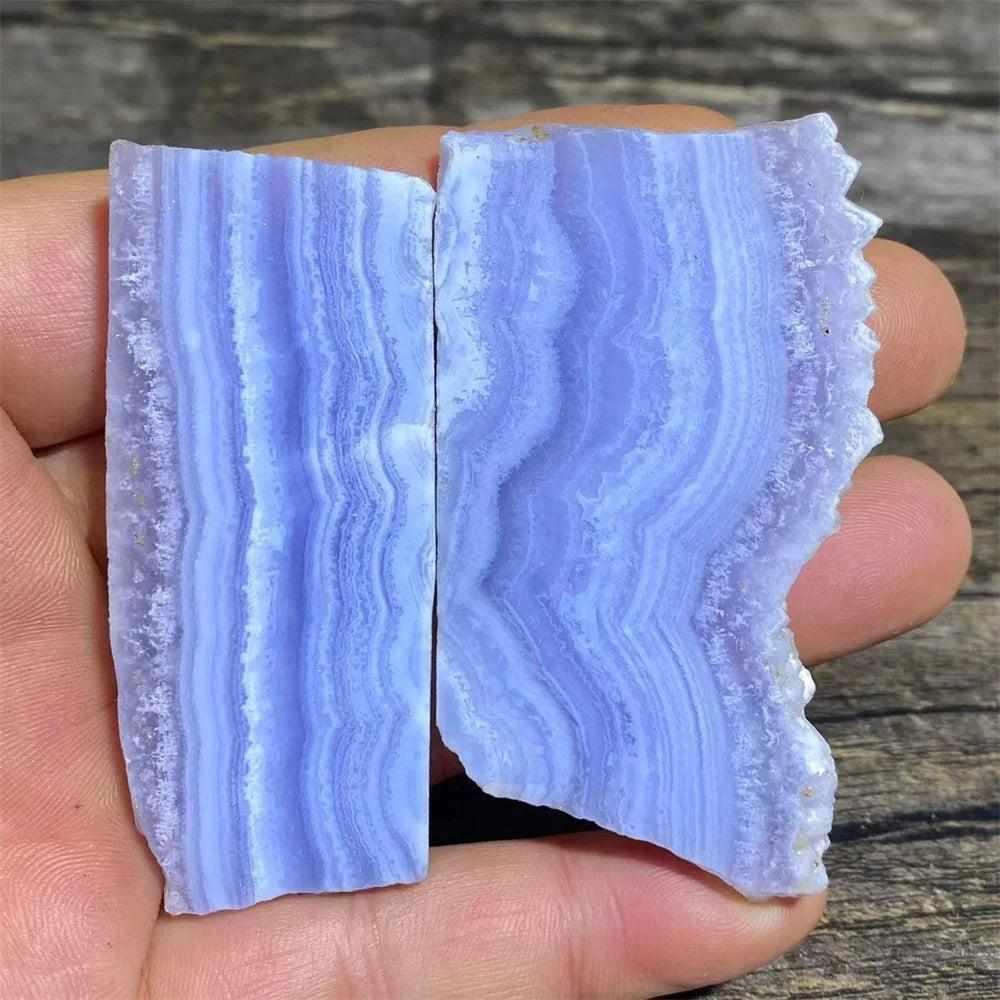 Polished Blue Lace Agate slab with soothing pale blue and white lace-like bands for calming Throat Chakra energy.