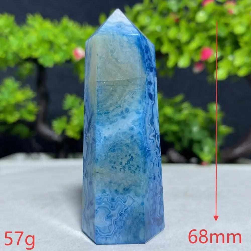 Polished Blue Lace Agate tower featuring calming sky-blue and white lace bands for Throat Chakra healing and tranquility.