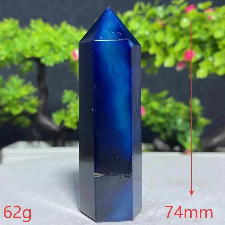 Polished Blue Lace Agate tower featuring calming sky-blue and white bands, perfect for throat chakra healing and focus.