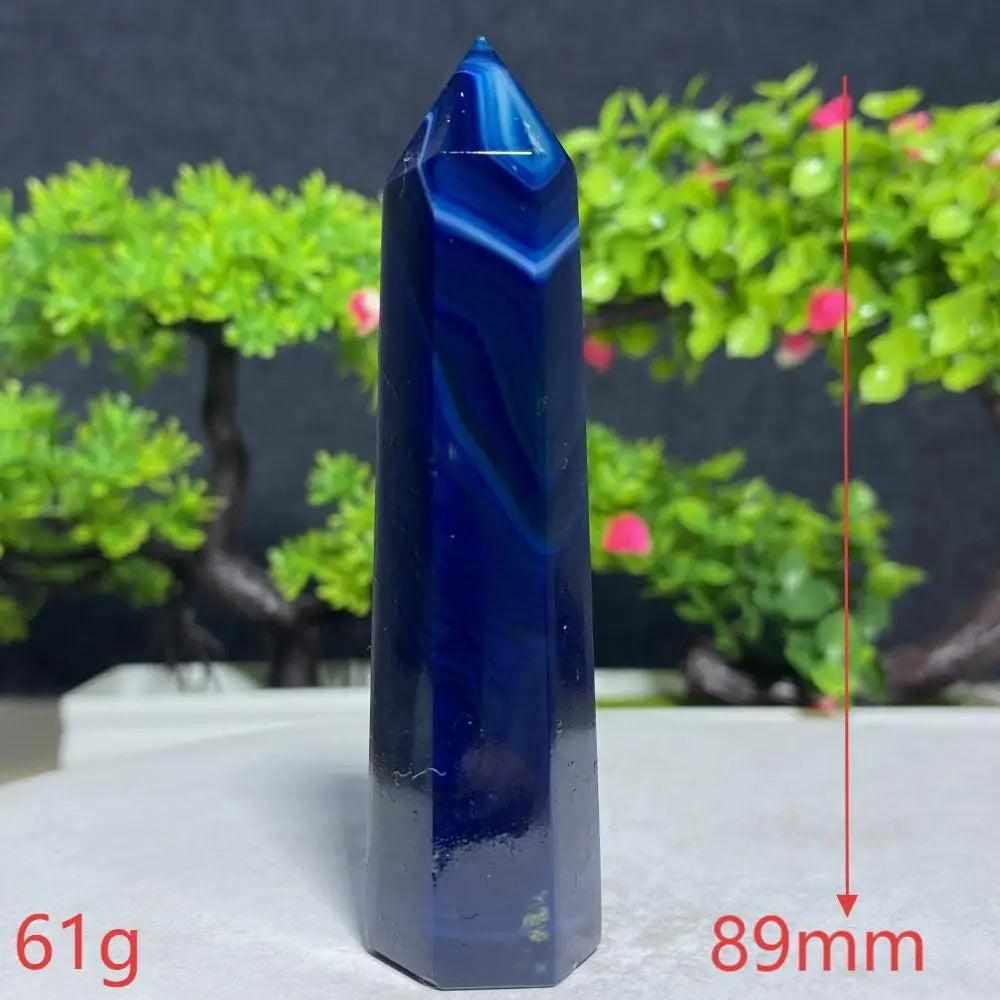 Polished Blue Lace Agate tower with deep blue banding, perfect for Throat Chakra calm and gentle communication.