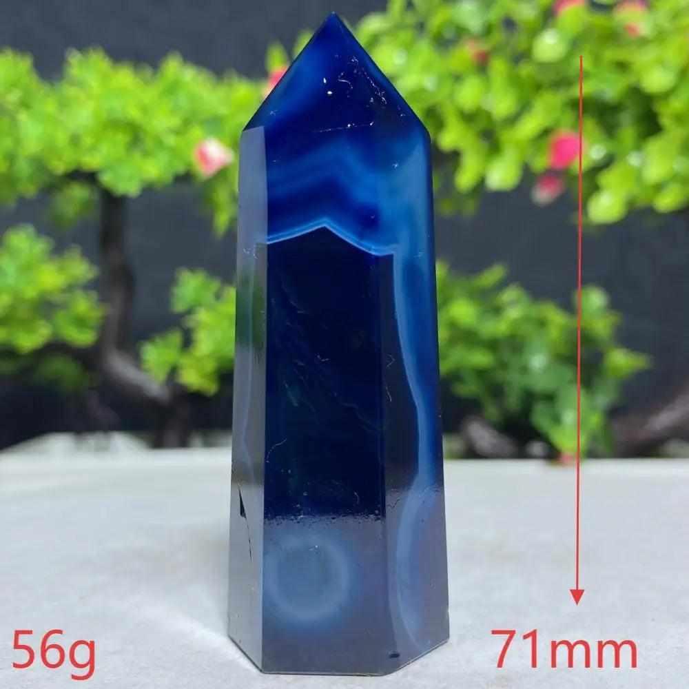 Polished Blue Lace Agate tower featuring deep blue banded patterns, perfect for Throat Chakra calm and gentle energy.