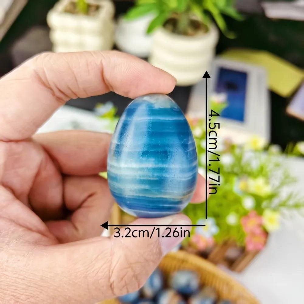 Polished Blue Onyx Crystal Egg for Calm & Clarity, showing cool, layered blue hues and natural banding.