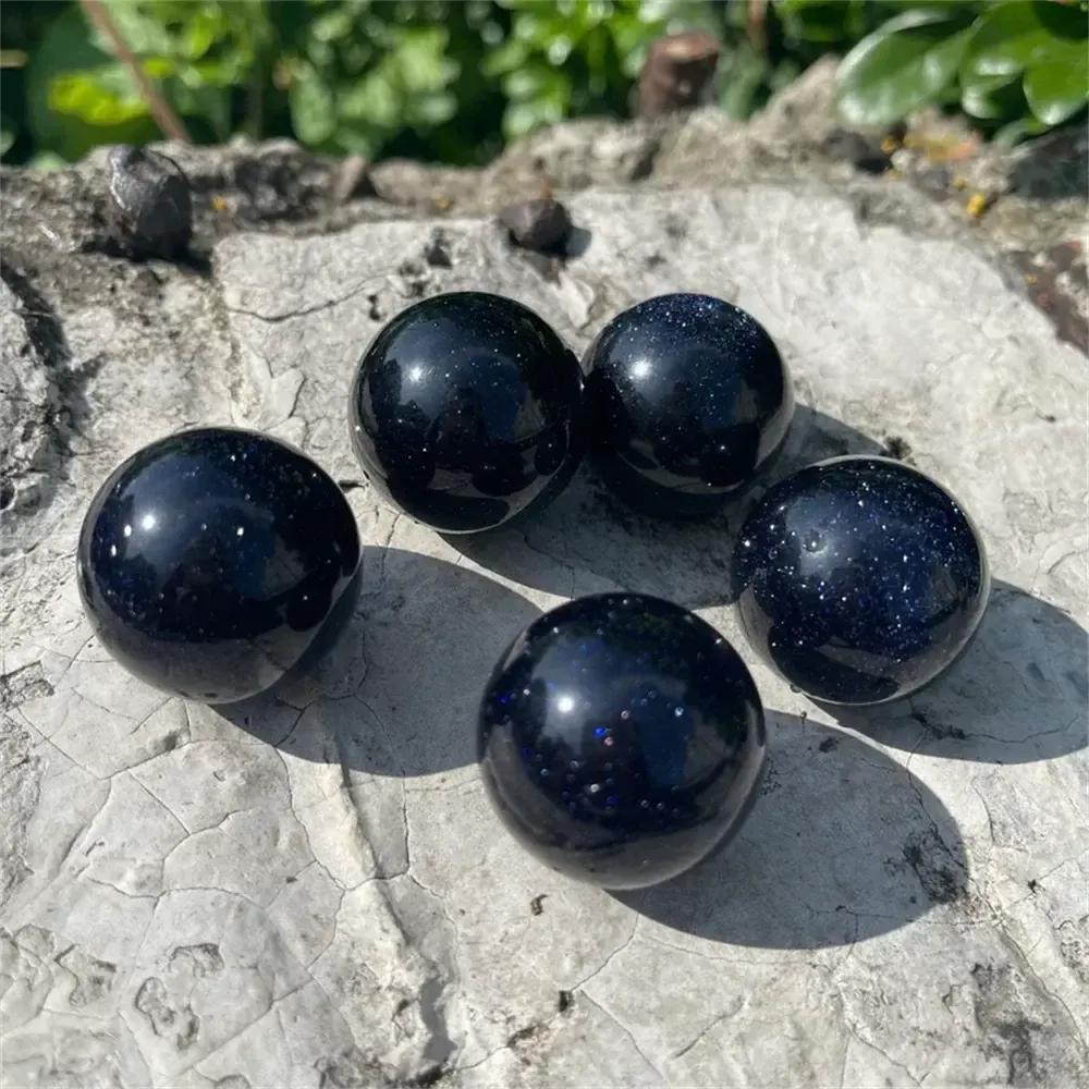Five shimmering blue sandstone spheres from Crystal Destiny, sparkling like a starlit night.