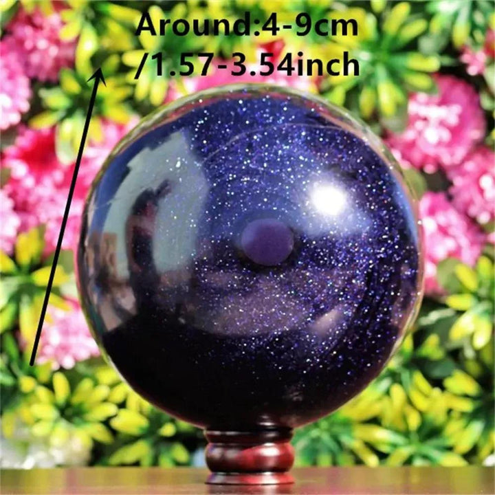 Crystal Destiny's Blue Sandstone Sphere, 4-9cm, with shimmering golden sparkles for ambition and confidence.