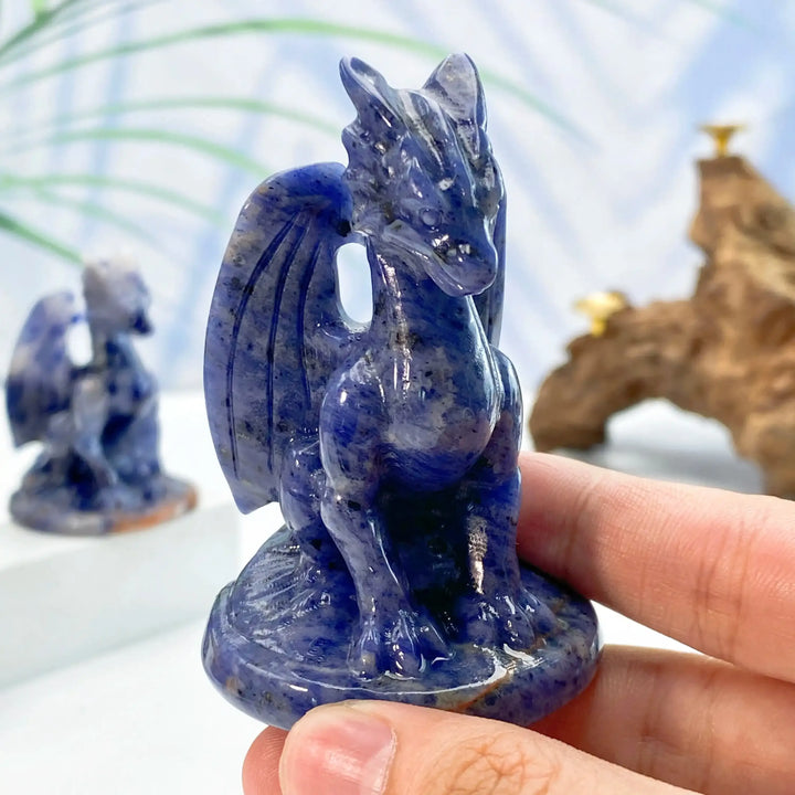 Polished blue sodalite dragon carving with intricate wings, perfect for Throat Chakra healing and crystal collections.