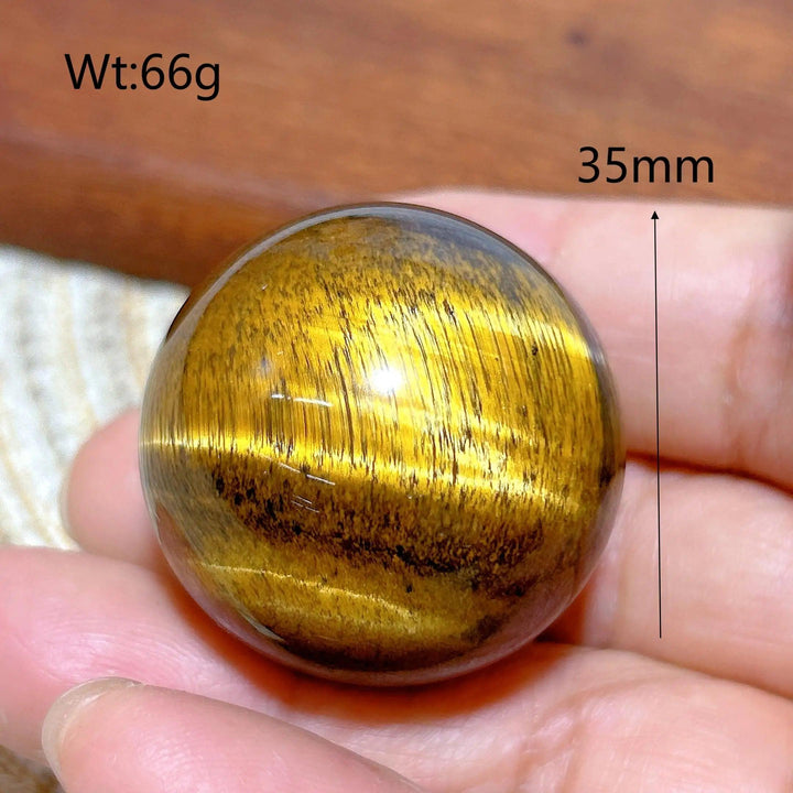 35mm flashy yellow Tiger Eye crystal sphere, a high-quality natural stone ball perfect for healing and home decor.