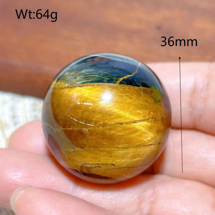 36mm Blue and Yellow Tiger Eye crystal sphere, a polished healing stone ball with flashy, natural mineral energy.