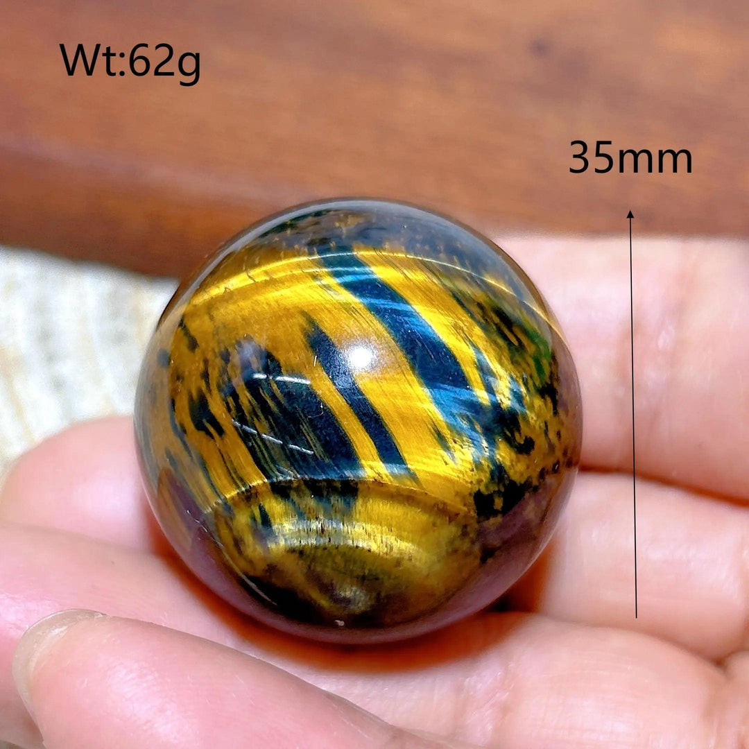35mm Blue and Yellow Tiger Eye crystal sphere, a polished healing stone ball with vibrant, flashy mineral energy.
