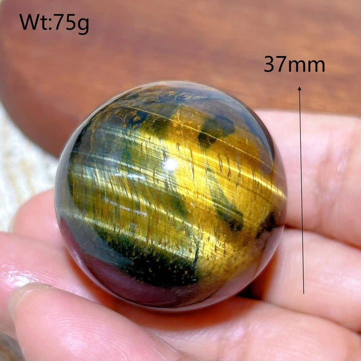 37mm flashy Blue and Yellow Tiger Eye crystal sphere, a high-quality healing mineral ball for energy and home decor.