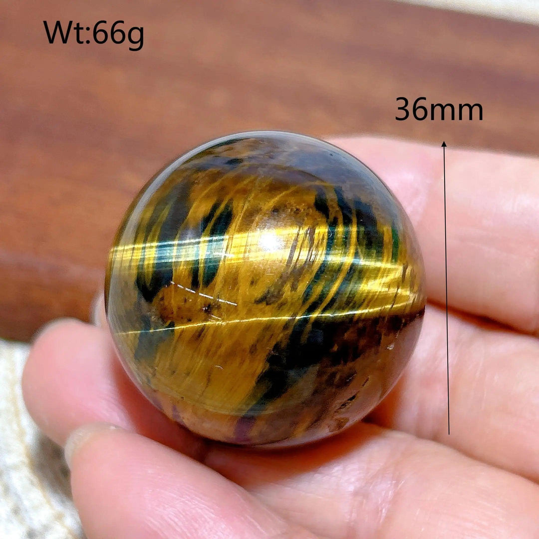 36mm natural blue and yellow Tiger Eye crystal sphere, a polished healing stone ball for energy and home decor.