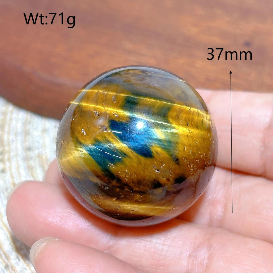 37mm flashy blue and yellow Tiger Eye crystal sphere, a natural healing stone ball perfect for Feng Shui home decor.