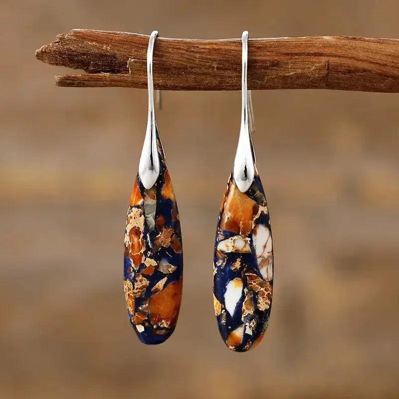 Bohemian Empire Jasper teardrop earrings from Crystal Destiny, featuring earthy blue and orange stones on silver boho hooks.