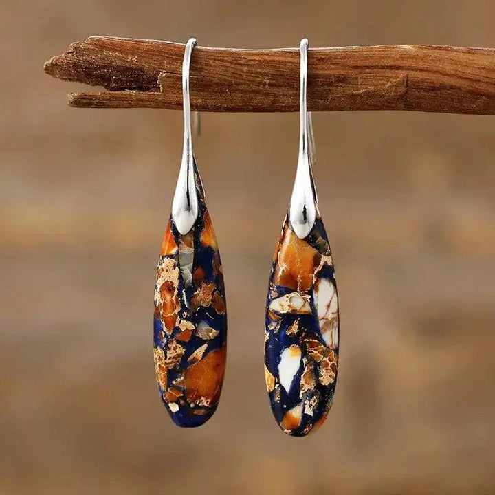 Bohemian Empire Jasper teardrop earrings from Crystal Destiny, featuring earthy blue and orange stones on silver boho hooks.