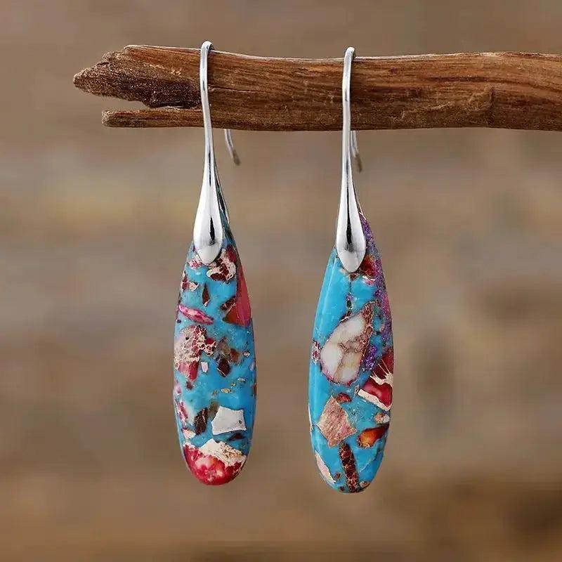 Bohemian Empire Jasper teardrop earrings from Crystal Destiny, featuring unique blue, red, and earthy patterns for grounding energy.