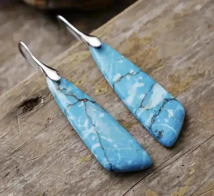 Bohemian Empire Jasper teardrop earrings from Crystal Destiny, featuring blue stones with earthy tones and grounding energy.