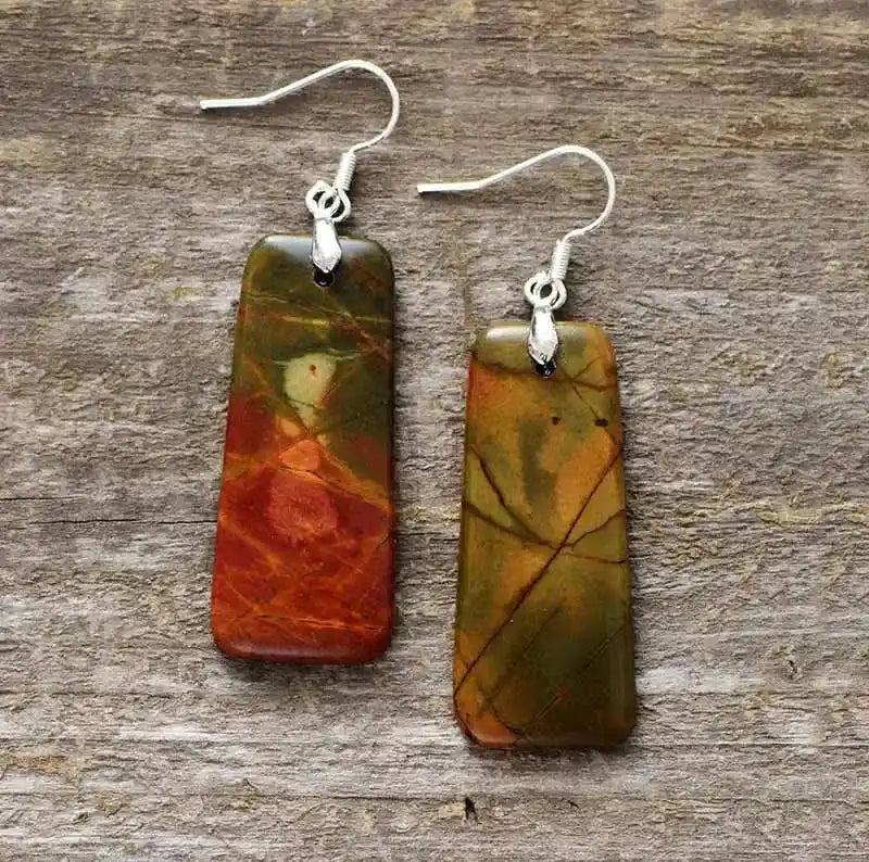 Boho Picasso Jasper drop earrings by Crystal Destiny, featuring unique red, green, and brown rectangular stones with silver hooks.