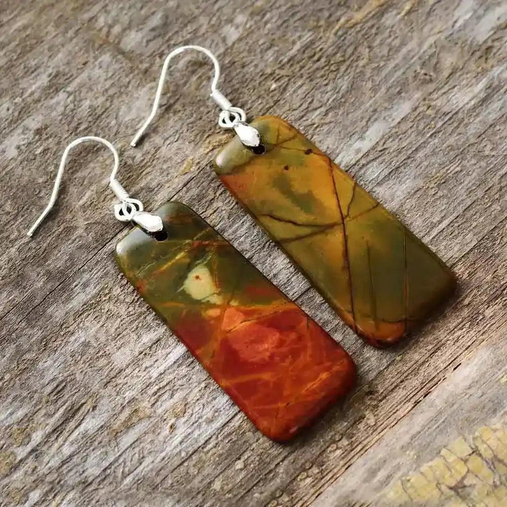 Boho Picasso Jasper drop earrings by Crystal Destiny, featuring unique patterns of earthy reds, greens, and browns.