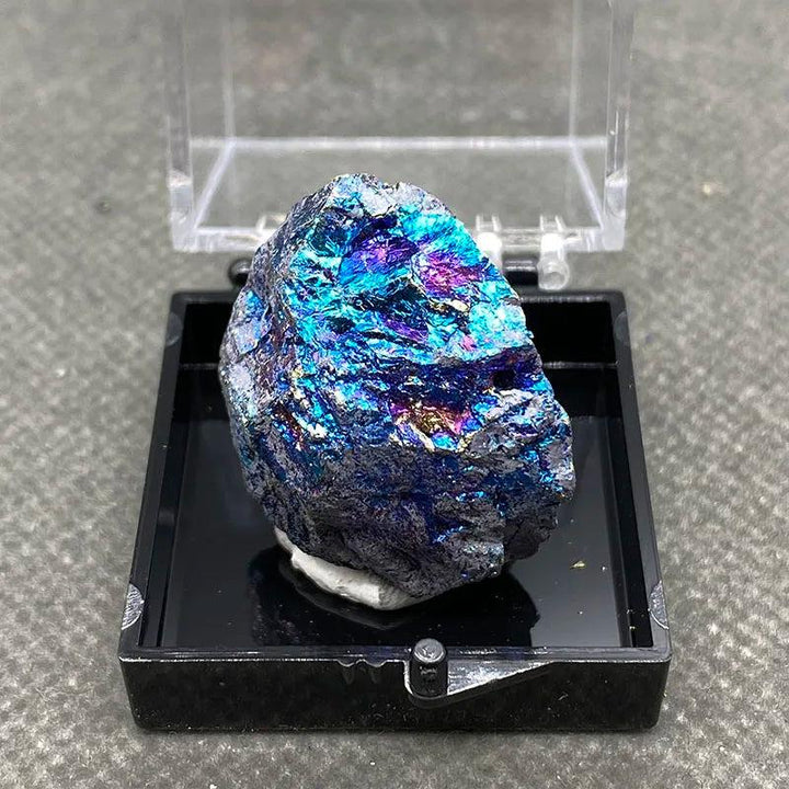 Raw Bornite Peacock Ore specimen with iridescent blue and purple hues, featuring metallic Pyrite for manifestation.