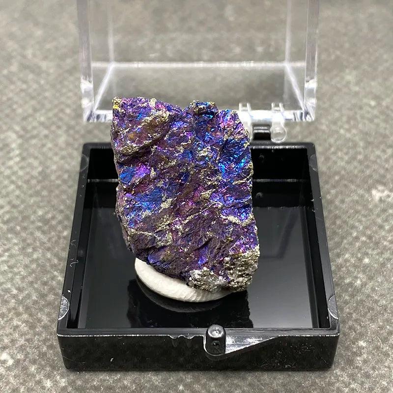Raw Bornite Peacock Ore specimen with metallic Pyrite, featuring iridescent purple and gold hues for manifestation.