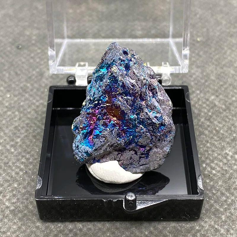 Raw Bornite Peacock Ore specimen with iridescent blue, purple, and gold hues and metallic Pyrite for manifestation.