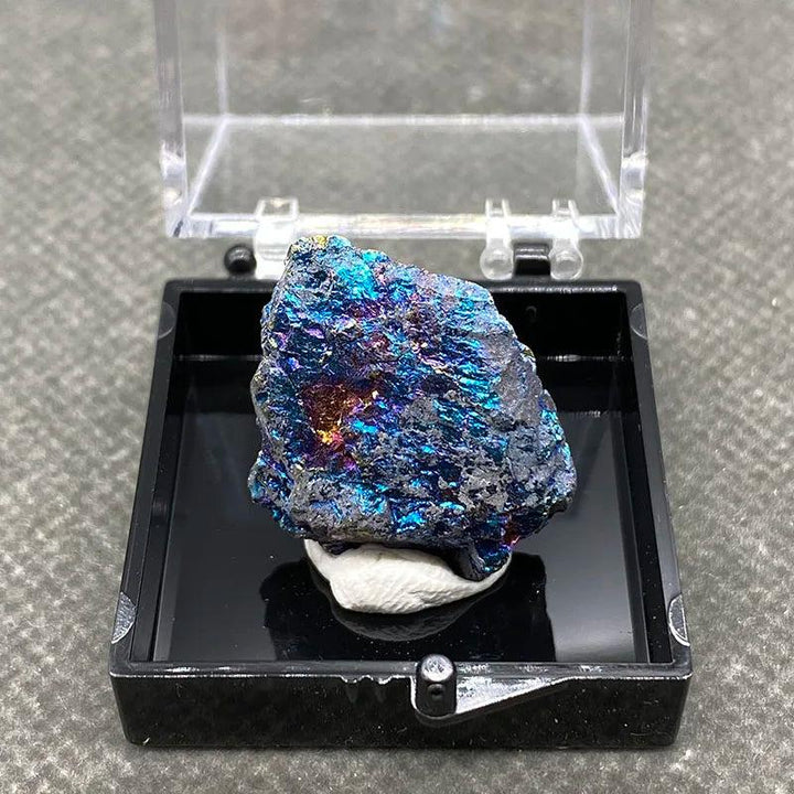 Raw Bornite Peacock Ore specimen with iridescent blue, purple, and gold hues and Pyrite for abundance and manifestation.