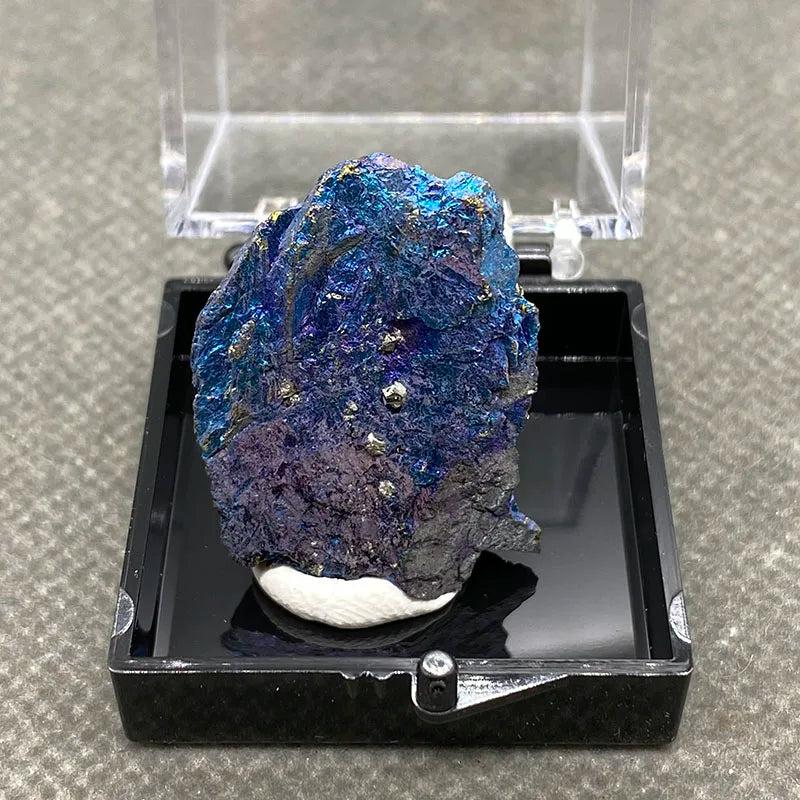 Raw Bornite Peacock Ore specimen with iridescent blue and purple hues and metallic Pyrite crystals for manifestation.