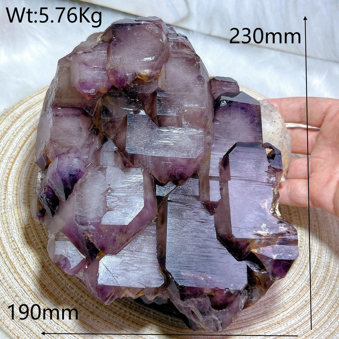 Rare 5.76kg Brazilian Amethyst skeletal elestial cluster with deep violet, layered points for calming, raw energy.