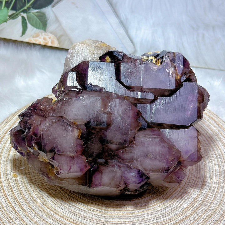 Rare Brazilian Amethyst skeletal elestial cluster with deep violet, stepped formations for calming, raw energy.