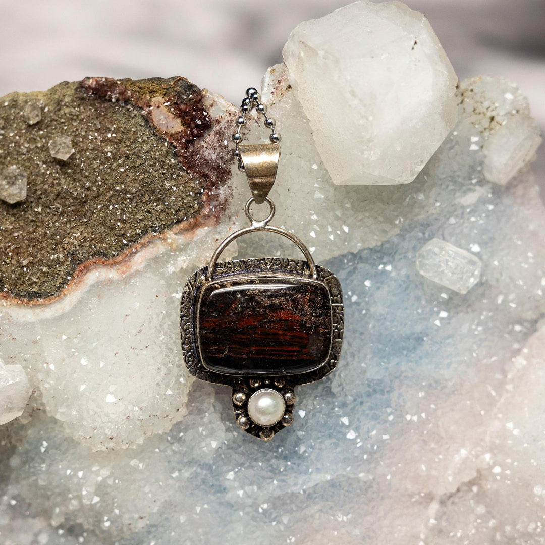 Brecciated Jasper 925 Sterling Silver Pendant: Deep red, rust, and charcoal-black mosaic stone with pearl accent.