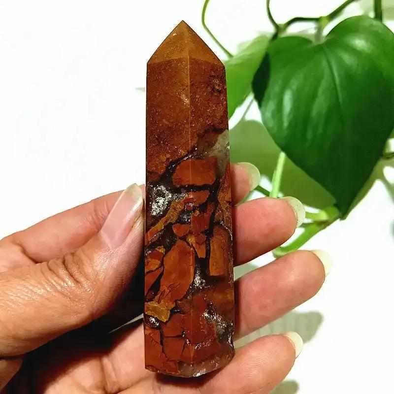 Polished Brecciated Jasper tower featuring warm red and brown mosaic patterns for grounding and root chakra balance.