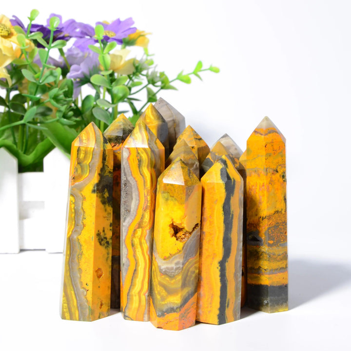 Vibrant Bumblebee Jasper Crystal Towers with yellow, orange, and black banding for solar plexus energy.