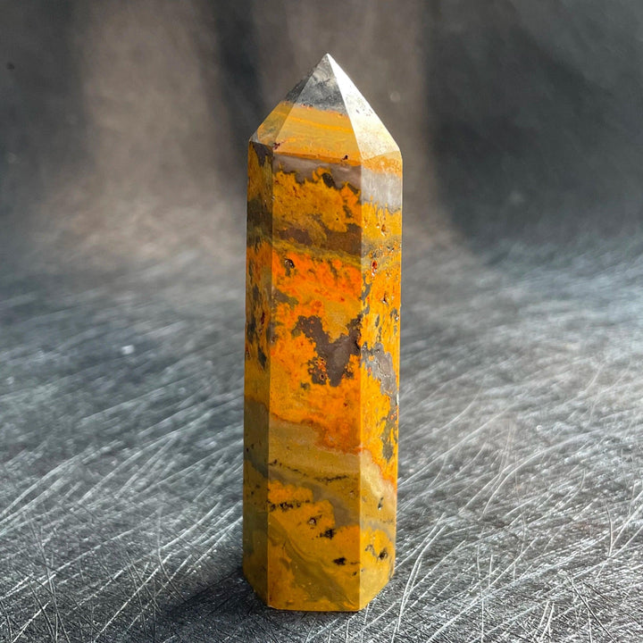 Bumblebee Jasper Crystal Tower with vibrant yellow, orange, and black banding for solar plexus energy.