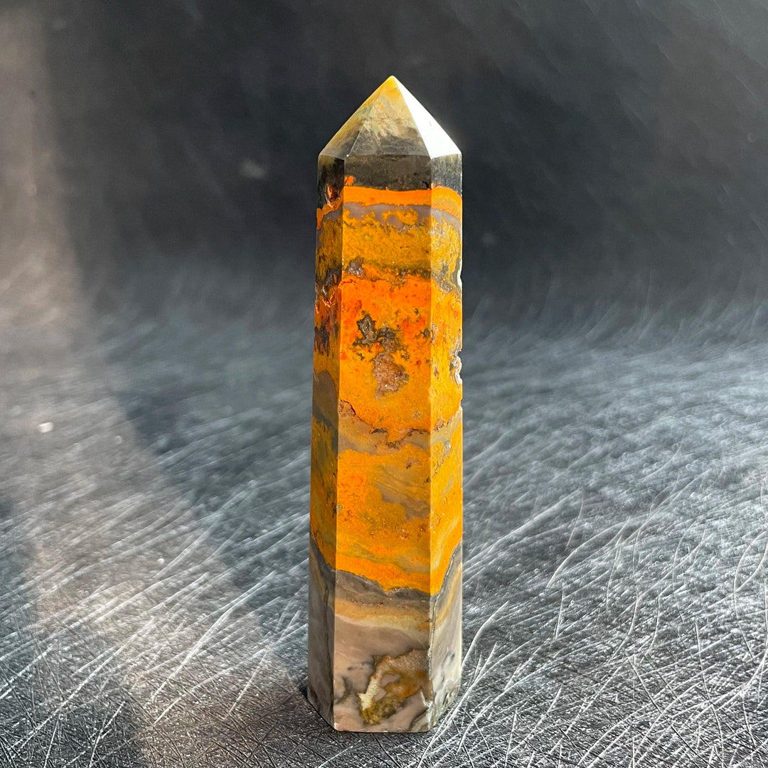 Bumblebee Jasper Crystal Tower with vibrant yellow, orange, and black banding for solar plexus energy.