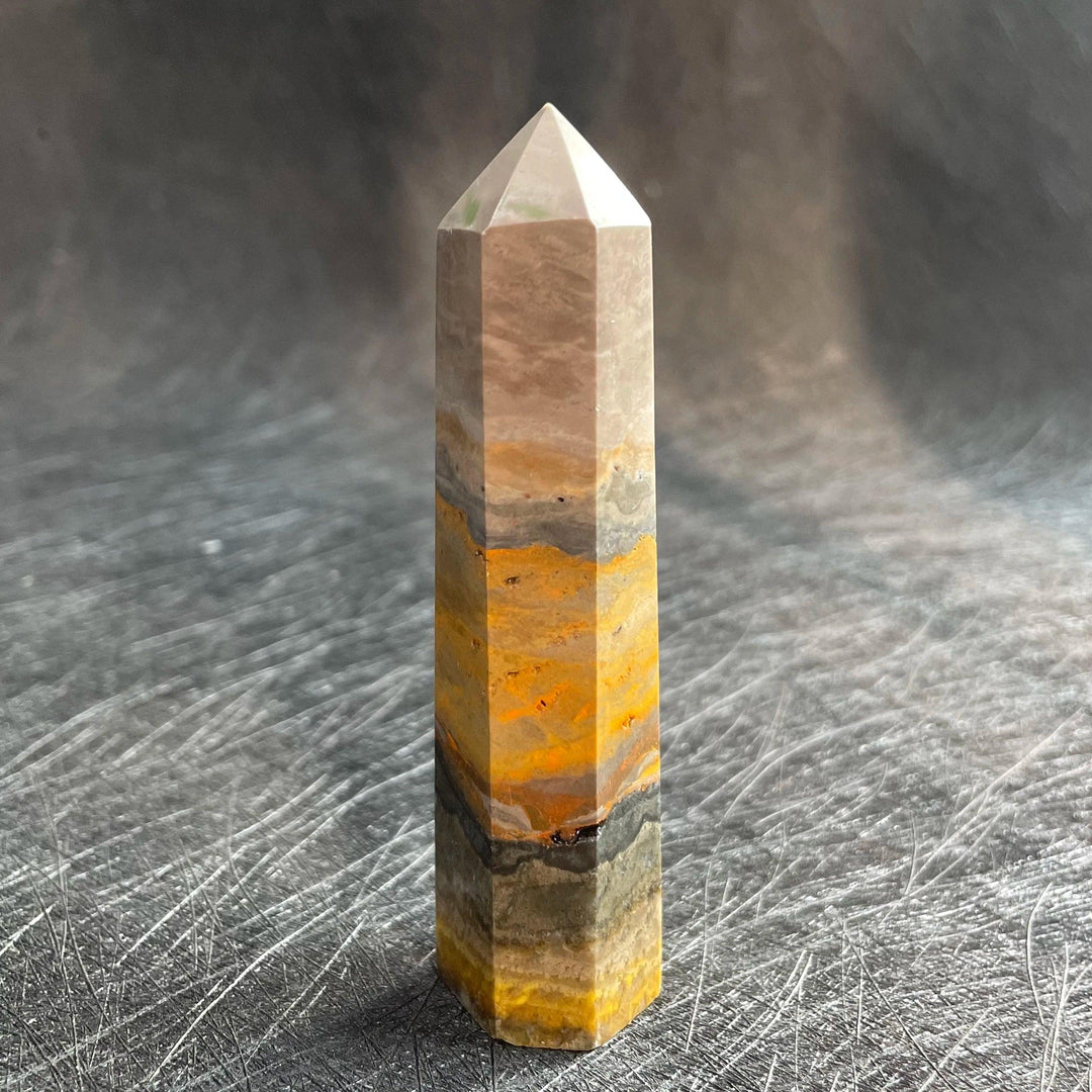 Bumblebee Jasper Crystal Tower with vibrant yellow, orange, and grey banding for solar plexus energy.