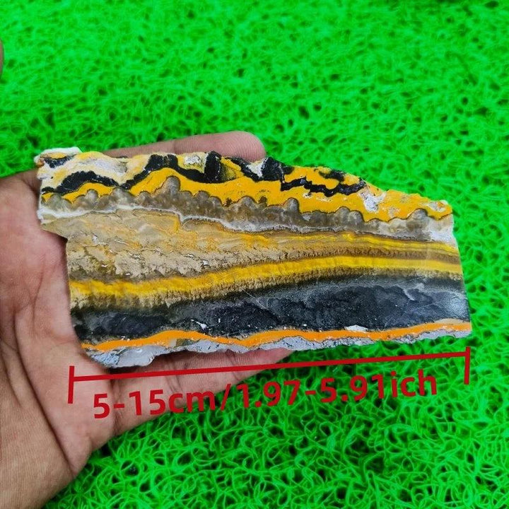 Polished Bumblebee Jasper Crystal Slice showing vibrant yellow, orange, and black volcanic bands.