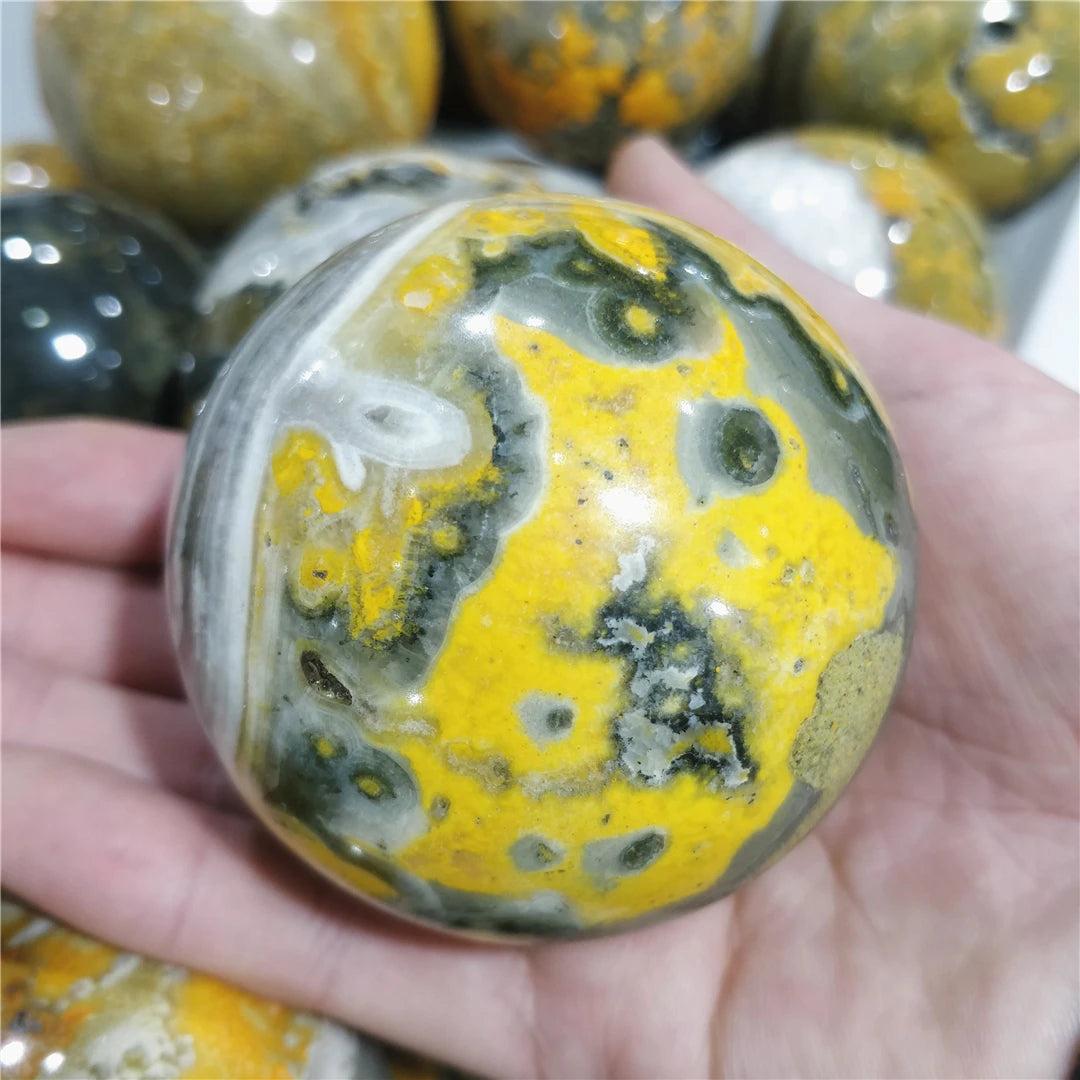 Bumblebee Jasper Crystal Sphere with vibrant yellow and grey volcanic bands for Solar Plexus energy.