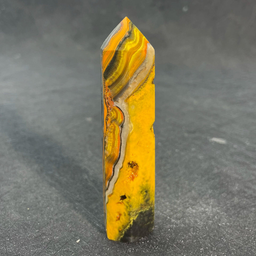 Vibrant Bumblebee Jasper Crystal Tall Tower with yellow and black bands for solar plexus energy.