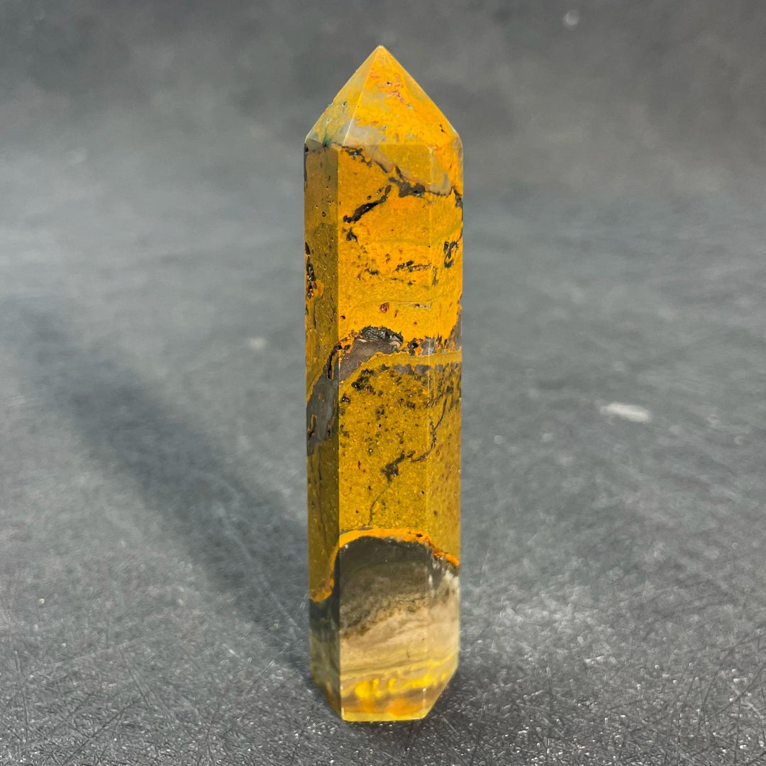 Bumblebee Jasper Crystal Tall Tower with vibrant yellow, orange, and black bands for solar plexus energy.